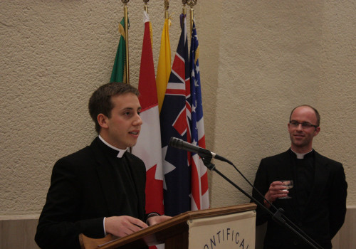 Rev. Mr. Daniele Russo makes a toast to the College during the community banquet in celebration of the Immaculate Conception.