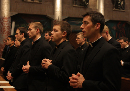 Jerome Krug ('19), Luke Syse ('17), and Tom Gramc ('17) participate in the Thanksgiving liturgy.